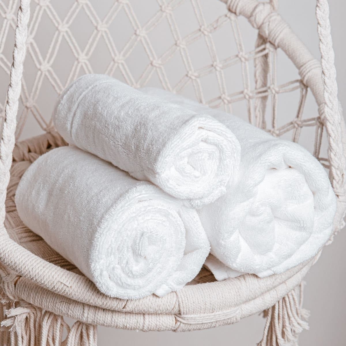 Rolled white spa towels