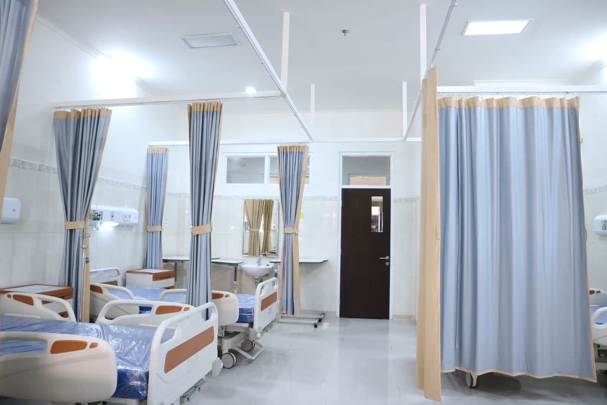 Hospital ward bays with made-up beds