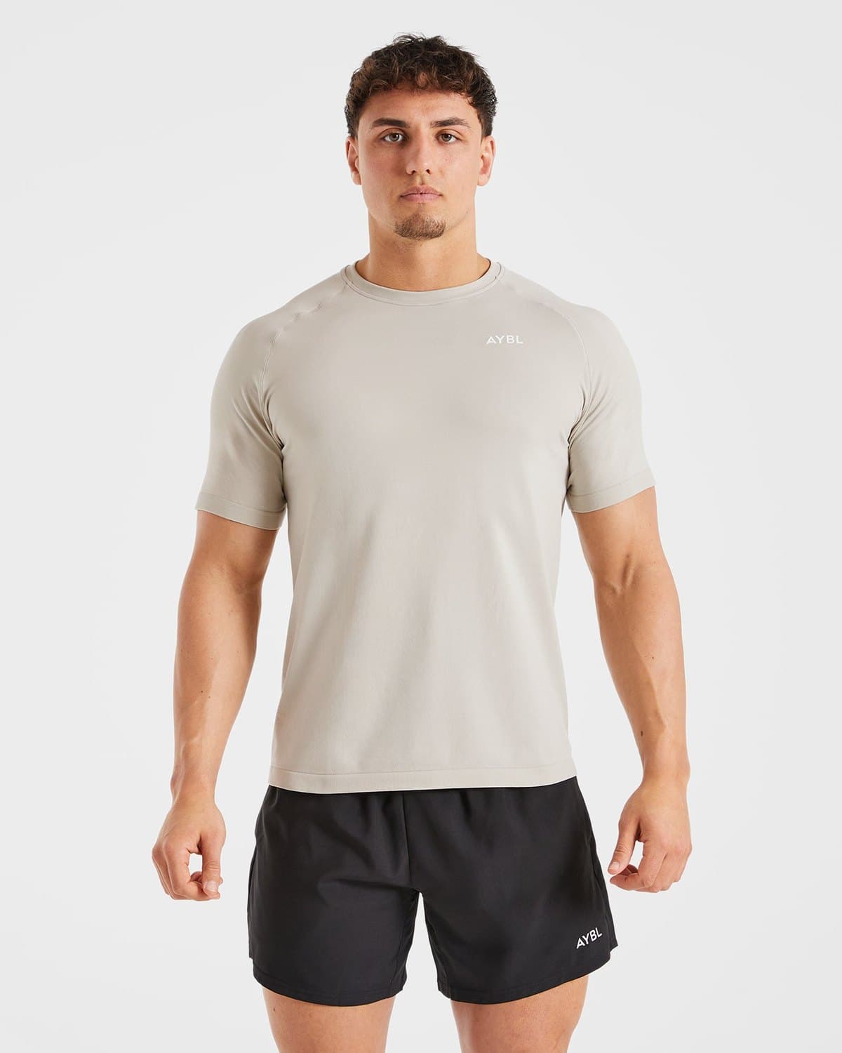 Male model in a stone seamless training t-shirt